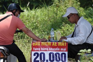 Bảo hiểm xe máy: Lãi khủng nhưng không mặn mà