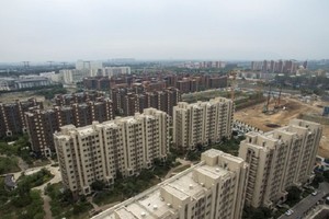 Doanh số bất động sản tính theo mét sàn tại Trung Quốc tăng 9,7% trong tháng 5. Ảnh: AFP