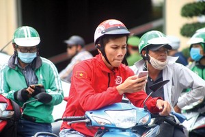 Từ ngày 20/7, thương hiệu Gojek Việt Nam sẽ thay màu áo GoViệt trên bản đồ ứng dụng gọi xe ở Việt Nam. Ảnh: Lê Toàn