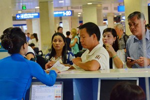 Nếu đề xuất tăng giá, phí của ACV được chấp thuận, hành khách đi máy bay có thể tốn kém hơn (Ảnh: Tấn Thạnh)