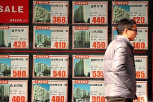 Các quảng cáo nhà đất "sinh lợi cao" và liên quan đến mê tín sẽ bị cấm tại Bắc Kinh. Ảnh:AFP