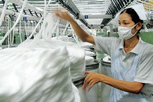 Sản phẩm sợi Việt Nam xuất sang Mỹ nằm trong 4 nước, vùng lãnh thổ bị điều tra chống bán phá giá. Ảnh: Vinatex