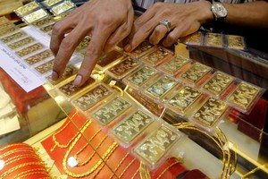 Sáng 19/7, giá vàng tiếp tục tăng, tỷ giá trung tâm giảm ngày thứ 3 liên tiếp