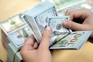 Nữ đại gia Sài Gòn sập bẫy đổi USD giá rẻ