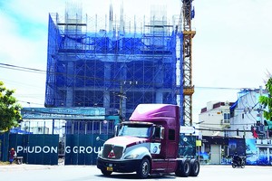 Căn hộ dự án Phú Đông Sky One dự kiến tăng giá bán từ 32 triệu đồng/m2 lên ít nhất 35 triệu đồng/m2 sau khi nhận được thông báo đóng tiền sử dụng đất. Ảnh: Việt Dũng.