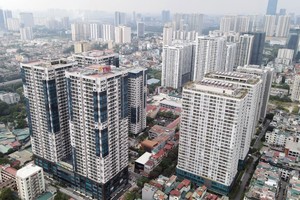 Đà tăng giá căn hộ dự báo tiếp tục duy trì ở mức 2 con số trong năm nay. Ảnh: Dũng Minh.