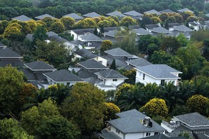 Đánh thuế chuyển nhượng bất động sản sẽ hạn chế tình trạng đầu cơ, “lướt sóng” nhà đất. Ảnh: Dũng Minh.