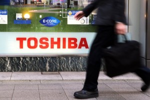 Hậu scandal gian lận tài chính, Toshiba phải bán một phần cho Canon