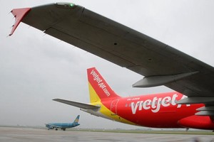 Vietnam Airlines và Vietjet khi nắm tổng cộng tới khoảng 87% thị phần hàng không nội địa (ảnh: Zing)