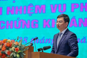 Phó Thống đốc NHNN Việt Nam Phạm Thanh Hà trình bày tham luận tại Hội nghị - Ảnh: VGP.