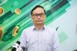 Ông Nguyễn Sơn, Chủ tịch HĐQT Tổng Công ty Lưu ký và Bù trừ Chứng khoán (VSD) trao đổi với báo chí bên lề tọa đàm "Lực đẩy dòng vốn mới" do Báo Tài chính- Đầu tư tổ chức ngày 23/7. Ảnh Dũng Minh