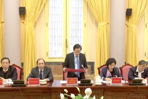 Phó Chủ nhiệm Thường trực Văn phòng Chủ tịch nước Giang Sơn đã công bố Lệnh của Chủ tịch nước đối với 6 luật. Ảnh: VGP/Nguyễn Hoàng