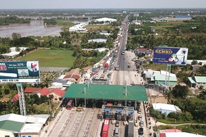 Dự án BOT Đầu tư xây dựng công trình Quốc lộ 1 đoạn tránh thị trấn Cai Lậy. Ảnh: Hải An