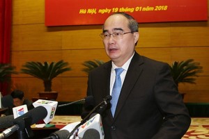 Ông Nguyễn Thiện Nhân, Bí thư Thành uỷ TP HCM, cho rằng "cấp trên đốt lửa to nhưng cấp dưới còn chậm". Ảnh: TTX