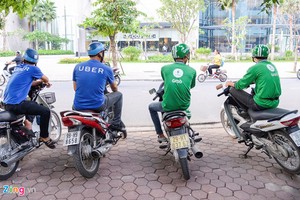 Bộ Tài chính chỉ ra bản chất của Uber, Grab là kinh doanh vận tải chứ không phải công nghệ. Ảnh: Quỳnh Trang.