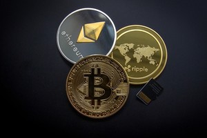 Bitcoin, Ethereum và Ripple là 3 loại tiền kỹ thuật số phổ biến nhất hiện nay. Ảnh: eCoin