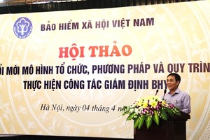 Phó Tổng Giám đốc BHXH Việt Nam Phạm Lương Sơn phát biểu tại Hội thảo.