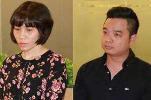 Hai bị can Châu Nguyên Anh và Phạm Quang Minh.