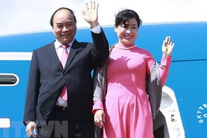 Thủ tướng Nguyễn Xuân Phúc và phu nhân. Ảnh: TTXVN.