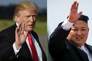Tổng thống Mỹ Trump, trái, và lãnh đạo Triều Tiên Kim Jong-un. Ảnh: AFP.