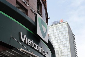 Hiện VCB còn nắm 8,19% vốn tại Eximbank và 6,97% vốn tại MB. Ảnh: Đức Thanh.