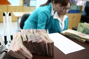 Ngân hàng Nhà nước yêu cầu các tổ chức tín dụng tăng cường kiểm tra nội bộ, kiểm toán nội bộ đảm bảo kịp thời phát hiện những sai phạm về mức lãi suất cho vay (ảnh minh họa).