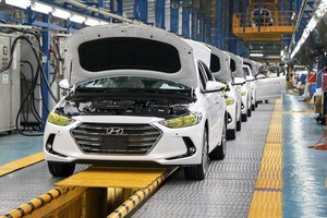 Chọn hướng đầu tư sản xuất tại Việt Nam, nhiều doanh nghiệp đang đạt kết quả kinh doanh vững chắc. Ảnh: Nguyễn Hà.