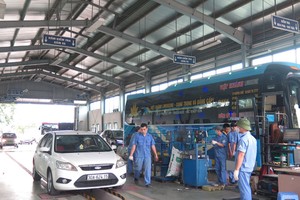 Hoạt động của một trung tâm đăng kiểm. Ảnh: Báo GTVT.