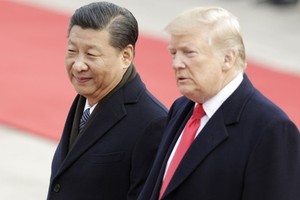 Chủ tịch Trung Quốc - Tập Cận Bình và Tổng thống Mỹ - Donald Trump. Ảnh: Bloomberg.