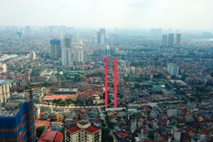 Dự án đường Đầm Hồng - Giáp Bát chạy qua đường Giải Phóng nối với đường Kim Đồng, nơi dự kiến làm hầm chui đến nay chưa được giải phóng mặt bằng. Ảnh: Phạm Hùng.