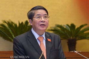 Chủ nhiệm UB Tài chính Ngân sách Nguyễn Đức Hải báo cáo giải trình một số vấn đề đại biểu Quốc hội nêu.