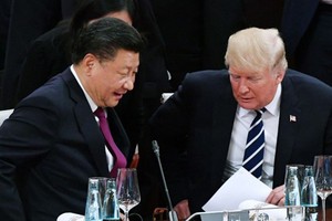 Tổng thống Mỹ Trump, phải, và Chủ tịch Trung Quốc Tập Cận Bình, cùng dự G20 năm nay tại Argentina. Ảnh: SCMP.