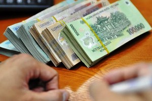 Từ 1/1/2019, người lao động, công nhân ở các huyện Gia Lâm, Đông Anh, Sóc Sơn, Thanh Trì...Hà Nội sẽ được tăng thêm tối đa 200.000 đồng/tháng. Ảnh: Anh Quân.