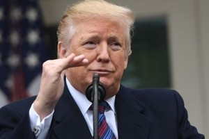 Tổng thống Mỹ Donald Trump trả lời trước báo giới tại Nhà Trắng ngày 4/1. Ảnh: Saul Loeb/AFP.