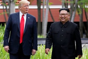 Tổng thống Mỹ Donald Trump và nhà lãnh đạo Triều Tiên Kim Jong-un (Ảnh: Reuters).