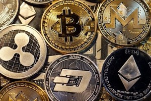 Hình mô phỏng các loại tiền kỹ thuật số phổ biến trên thế giới. Ảnh: AFP.