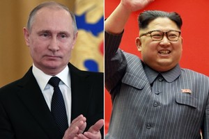 Tổng thống Nga Putin (trái) và lãnh đạo Triều Tiên Kim Jong-un. Ảnh: AP.