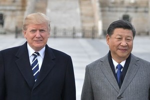 Tổng thống Mỹ Trump (trái) và Chủ tịch Trung Quốc Tập Cận Bình tại Bắc Kinh tháng 11/2017. Ảnh: AFP.