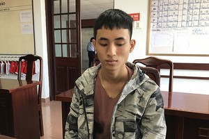 Võ Anh Tuấn tại cơ quan điều tra. Ảnh: Trần Hồng.