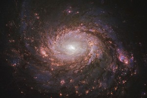 Thiên hà M77 trong ảnh chụp của kính viễn vọng không gian Hubble. Ảnh: NASA.