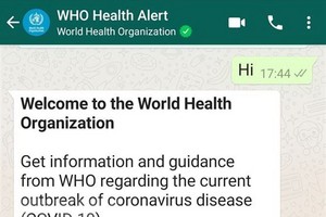 Ứng dụng WhatsApp WHO Health Alert truy vấn thông tin chính thức về COVID-19 qua tổng đài +41798931892 do WHO quản lý. (Ảnh: Đình Lượng/TTXVN).