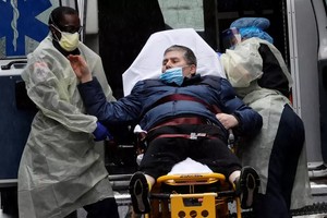 Khoảng 1/3 dân số Mỹ đã mắc Covid-19. (Ảnh: Reuters).