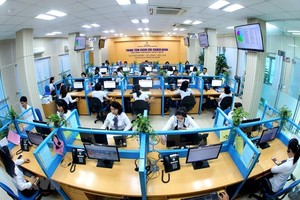 Các Trung tâm Chăm sóc khách hàng - nơi tiếp nhận thông tin và hướng dẫn khách hàng sử dụng các dịch vụ trực tuyến của ngành điện. (Ảnh minh họa: Ngọc Hà/TTXVN)