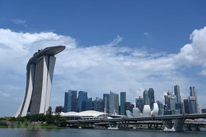 Khu vực quận tài chính thương mại ở Singapore. (Ảnh: AFP/TTXVN).