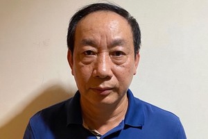 Ông Nguyễn Hồng Trường tại cơ quan công an. Ảnh: Bộ Công an