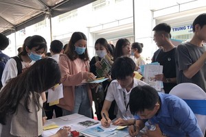 Trong quý 4, nhu cầu tuyển dụng, tìm việc có xu hướng tăng mạnh. Ảnh: KT.