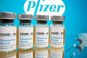 Thế giới lạc quan trước thông tin về vaccine Covid-19. Ảnh: KT.
