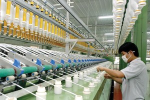 Cộng đồng doanh nghiệp đánh giá tích cực về những nỗ lực cải thiện môi trường kinh doanh của Việt Nam. Ảnh: Đ.T.