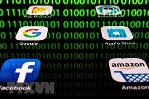 Biểu tượng của Amazon, Apple, Google và Facebook. (Ảnh: AFP/TTXVN).