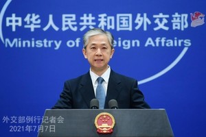 Phát ngôn viên Bộ Ngoại giao Trung Quốc Uông Văn Bân phát biểu tại cuộc họp báo ở Bắc Kinh ngày 7.7. BỘ NGOẠI GIAO TRUNG QUỐC.